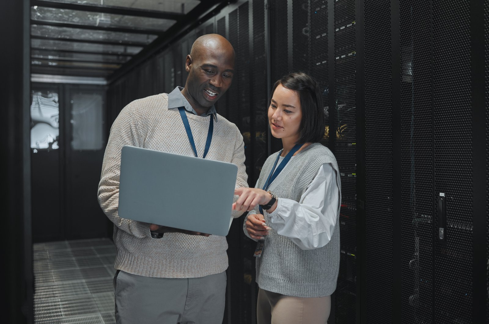 business-black-man-and-woman-with-laptop-servers-and-cyber-security-for-connection-data-analytic.jpg